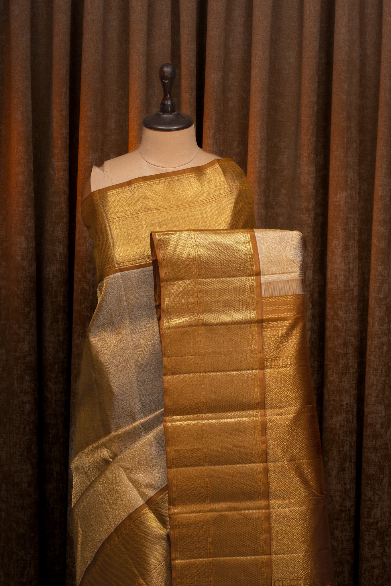 Champagne gold iruthalaipakshi brocade pure kanchipuram silk saree