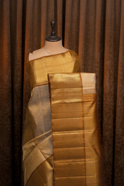Champagne gold iruthalaipakshi brocade pure kanchipuram silk saree