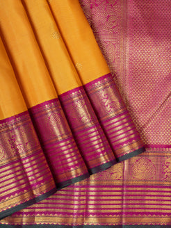 Yellow and magenta pure Kanchipuram silk saree