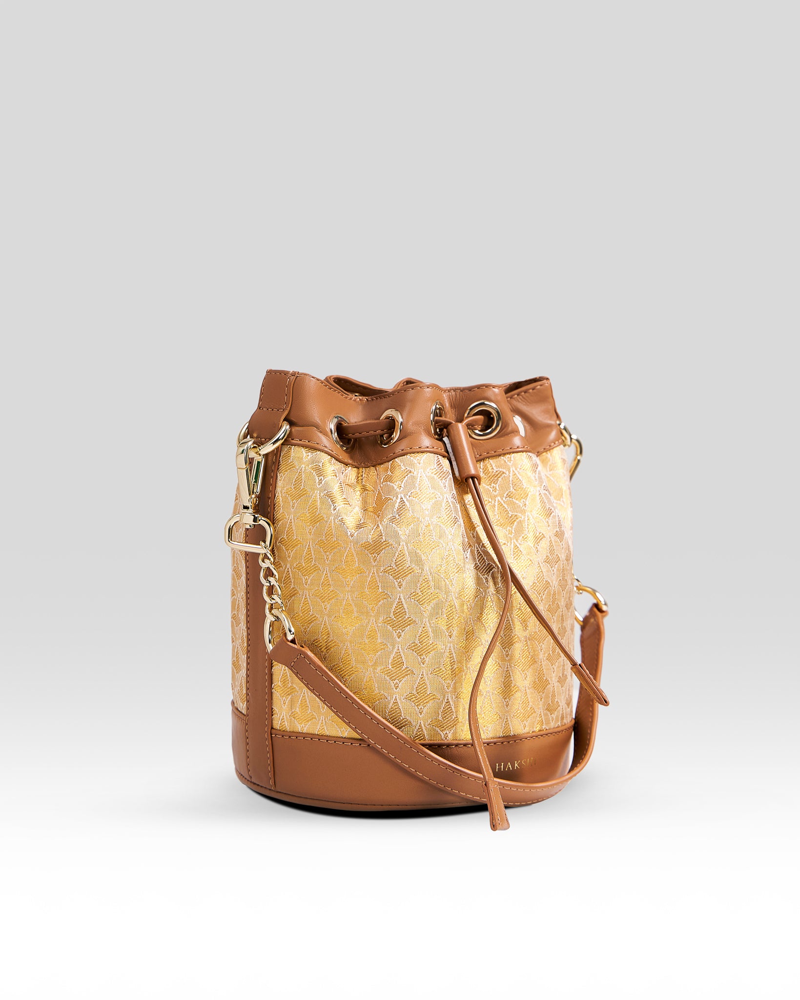 Potli Bag resting elegantly on the floor, showcasing its intricate design and cultural charm.
