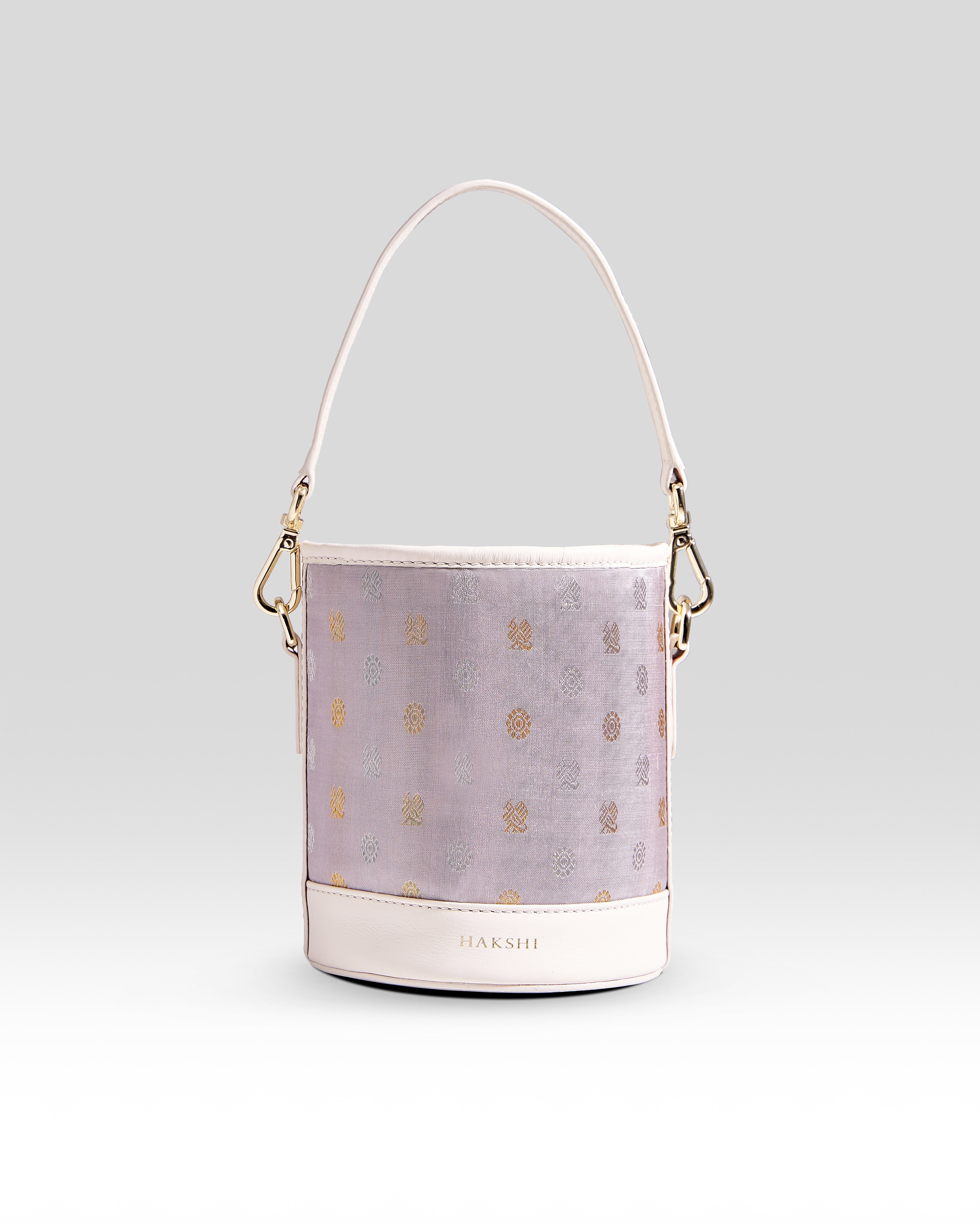 Adhya Bucket Bag in Grey & Ivory: A stylish and versatile accessory featuring a chic color combination, perfect for adding a touch of sophistication to any outfit
