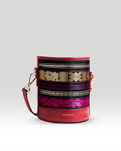 Pure Kanchipuram Silk Bucket Bag: Exquisite Handcrafted Accessory Featuring Luxurious Silk Fabric, Perfect for Adding Elegance to Any Ensemble.